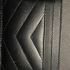 Black leather wallet by Saint Laurent Monogram Wallet
